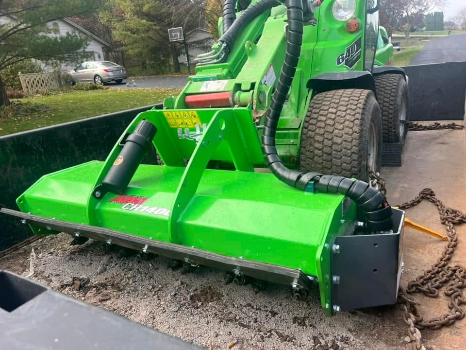 Forestry mulcher clearing brush