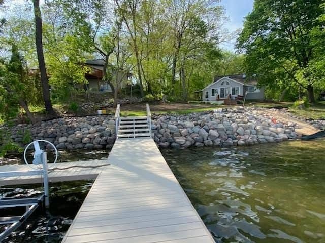 Pier and rock shoreline on a lake property